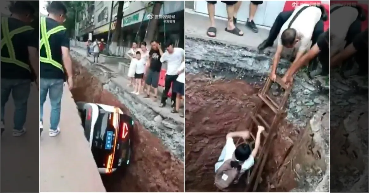 குழிக்குள் விழுந்த ரோபோ டாக்சி.. ஏணியை பிடித்து மேலே வந்த பெண் பயணி.. என்ன நடந்தது..?
