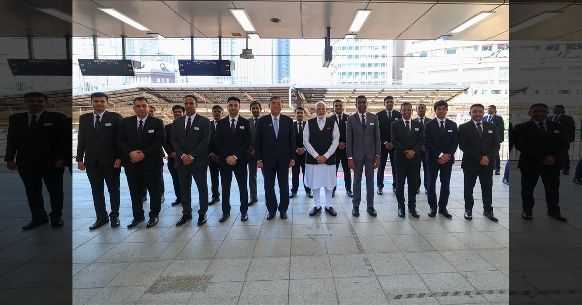 pm modi traveled by bullet train with the japanese pm