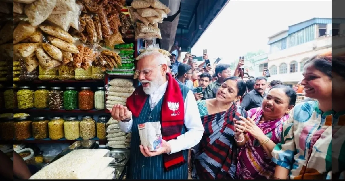 தம்பி!! ஒரு ஜல்முரி கொடுப்பா!!  சாலையோர கடையில் மசாலா பொரி சாப்பிட்ட மோடி! வைரல் வீடியோ!