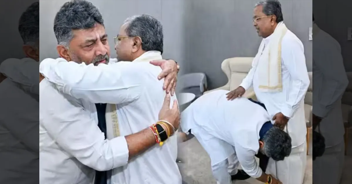 சித்தராமையா காலில் விழுந்து டி.கே.சிவக்குமார் மரியாதை! கர்நாடக முதல்வராக பதவியேற்பதற்கு முன் ஆசி!!