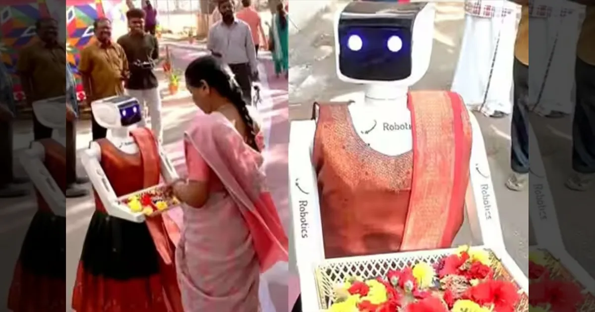 இந்தாங்க இனிப்பு எடுத்துக்குங்க! சாக்லெட் கொடுத்து வரவேற்பு! தமிழக தேர்தல் வாக்குப்பதிவில் அசத்தும் ரோபோ!!